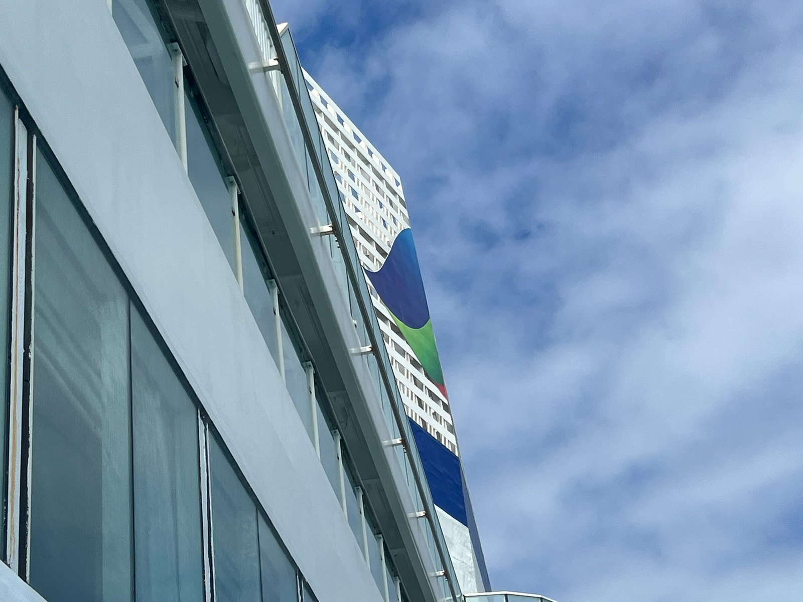 A building flying flags at the port of Santander