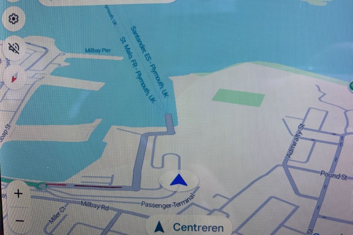 Car satellite navigation screen showing the route into Plymouth ferry port
