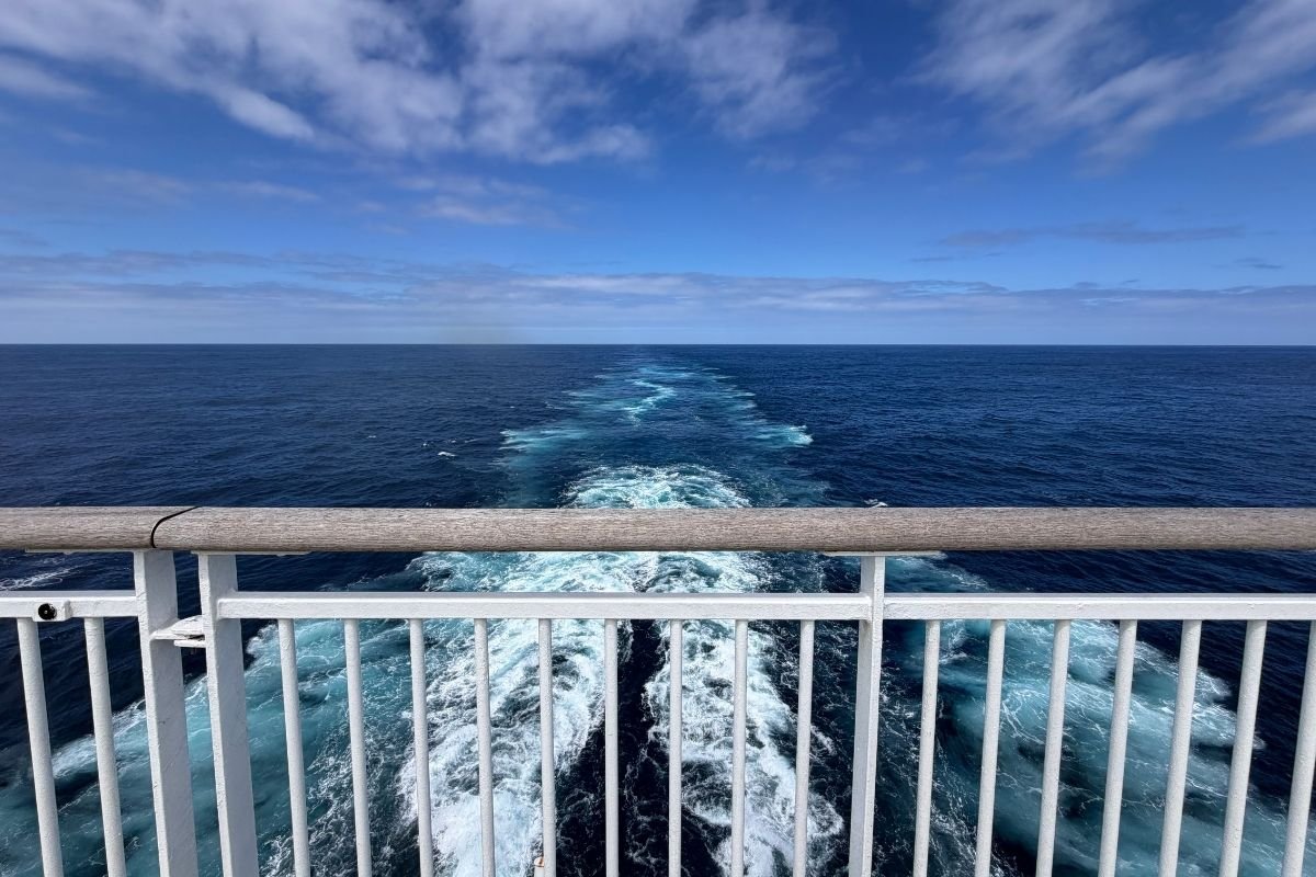 The wake of a Brittany Ferries ship seen from the stern deck